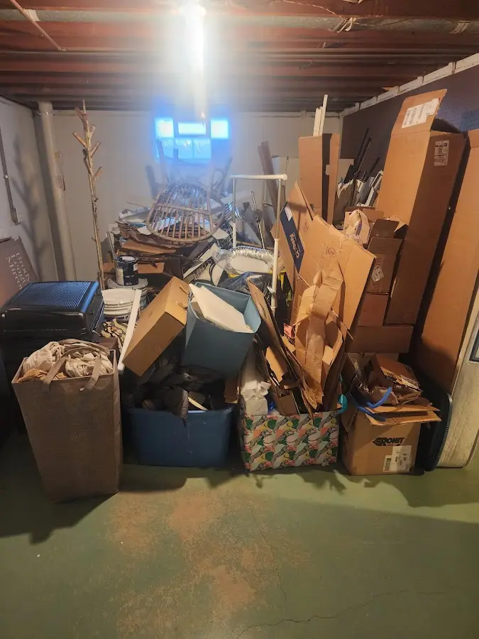 Roll-off dumpster container at job site for Yard Waste Dumpster Rental in Totowa